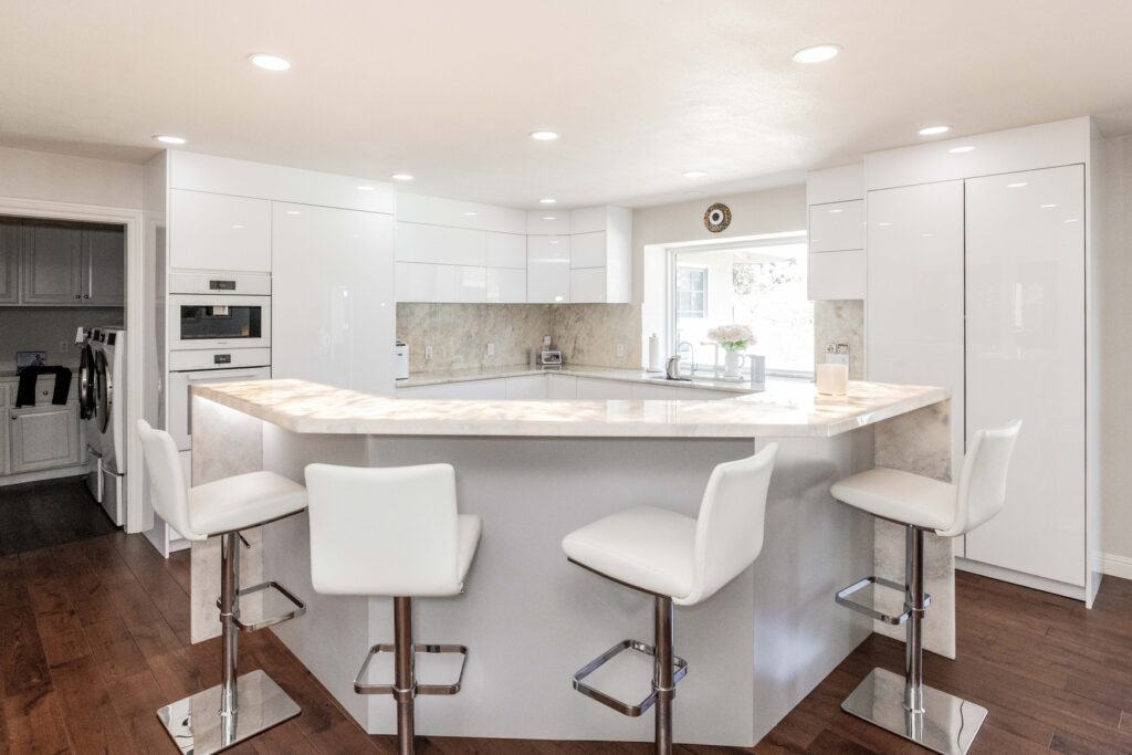 all white modern kitchen with solid surface dekton counters